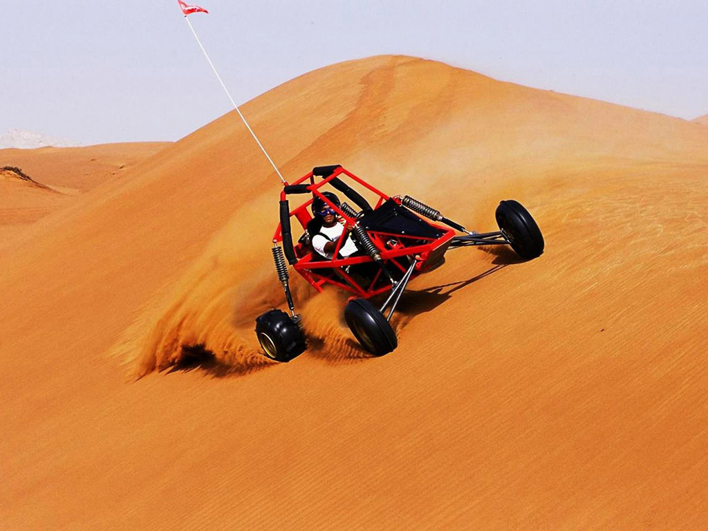 Sand-boarding: Surfing the Dunes on Your Desert Adventure